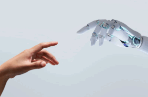 Human hand reaching toward a robotic hand, symbolizing the connection between people and artificial intelligence.