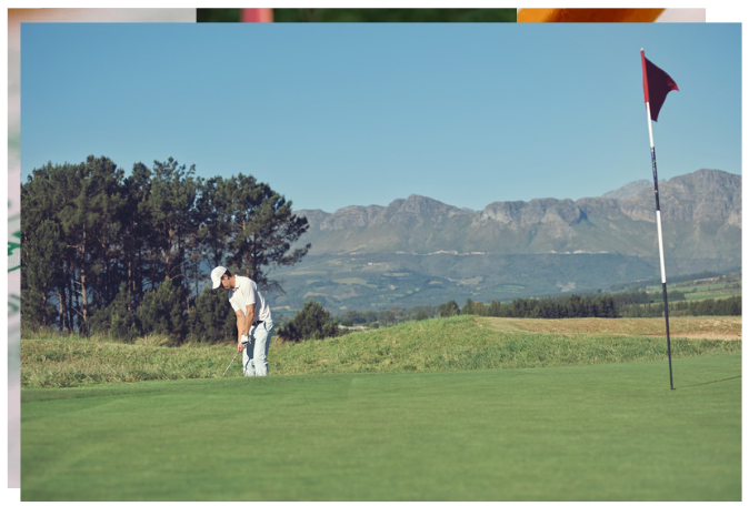 Golfer hitting a chip shot toward the flag on a sunny day, practicing short game technique.